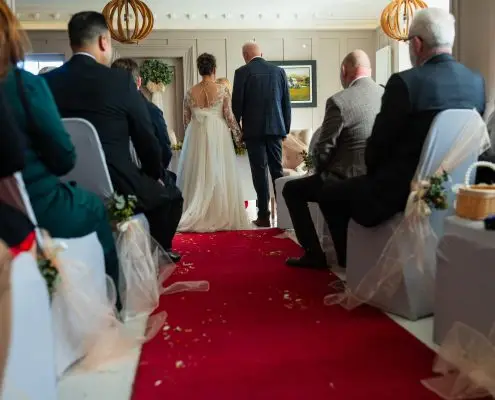 “Beautiful indoor wedding ceremony setting at Llwyn Country House, Wales